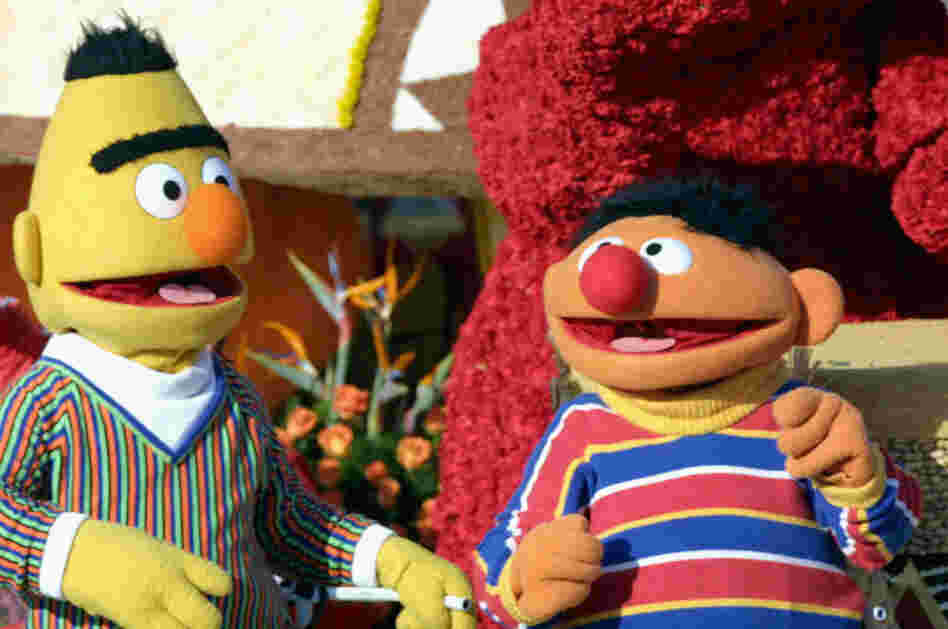 Sesame Street's Bert and Ernie ride the  "Music Makes Us Family" float in the 2005 Tournament of Roses Parade.