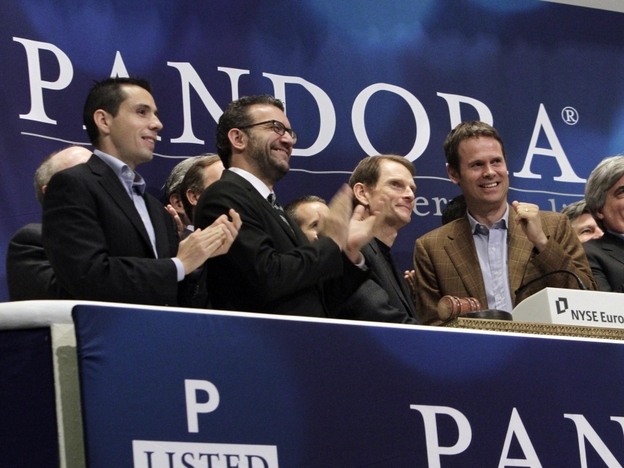 Pandora Radio executives ring the opening bell at the New York Stock Exchange to celebrate their company's initial public offering June 15.