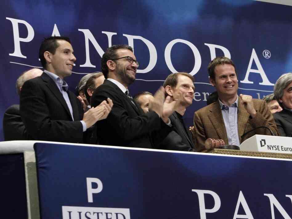 Pandora Radio executives ring the opening bell at the New York Stock Exchange to celebrate their company's initial public offering June 15.