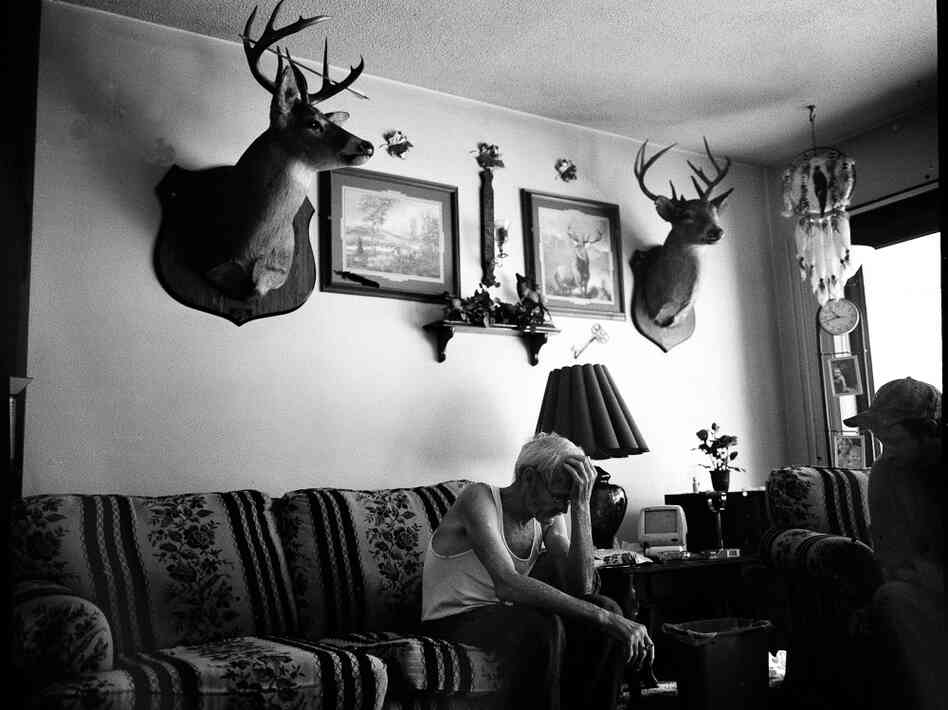 Jimmy Weekley, 71, shown here with a friend, says that when he was a kid, there were more than two dozen homes in Pigeonroost Hollow, W.Va. "But right now no one else lives in this hollow except me, James Weekley, and the coal company." Jimmy Weekley, 71, shown here with a friend, says that when he was a kid, there were more than two dozen homes in Pigeonroost Hollow, W.Va. "But right now no one else lives in this hollow except me, James Weekley, and the coal company."