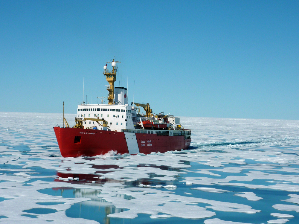 As Arctic temperatures rise, the Northwest Passage will be open up for longer periods of time. Here, the Louis slices through sea ice.