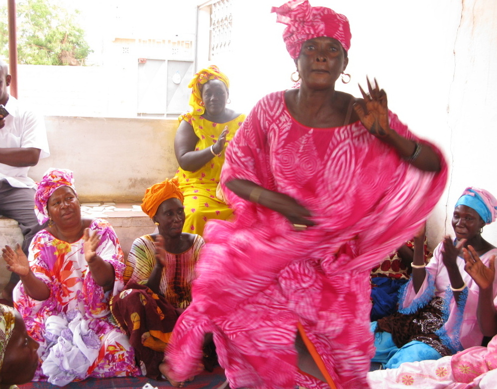 Lightening the mood, the otherwise serious health care proceedings are  punctuated by song and dance.