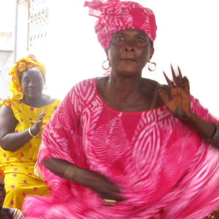 Lightening the mood, the otherwise serious health care proceedings are  punctuated by song and dance.