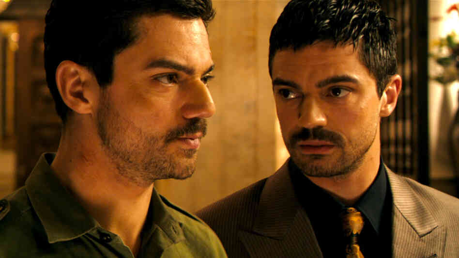 In The Devil's Double, Dominic Cooper plays two characters: Saddam Hussein's oldest son, Uday, and Iraqi military man Latif Yahia, who was made to undergo plastic surgery so he could become Uday's body double. In The Devil's Double, Dominic Cooper plays two characters: Saddam Hussein's oldest son, Uday, and Iraqi military man Latif Yahia, who was made to undergo plastic surgery so he could become Uday's body double.