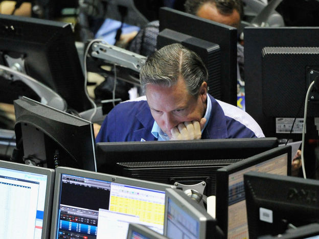 A trader studies his computer screen in the VIX pit at the Chicago Board Options Exchange on April 27.