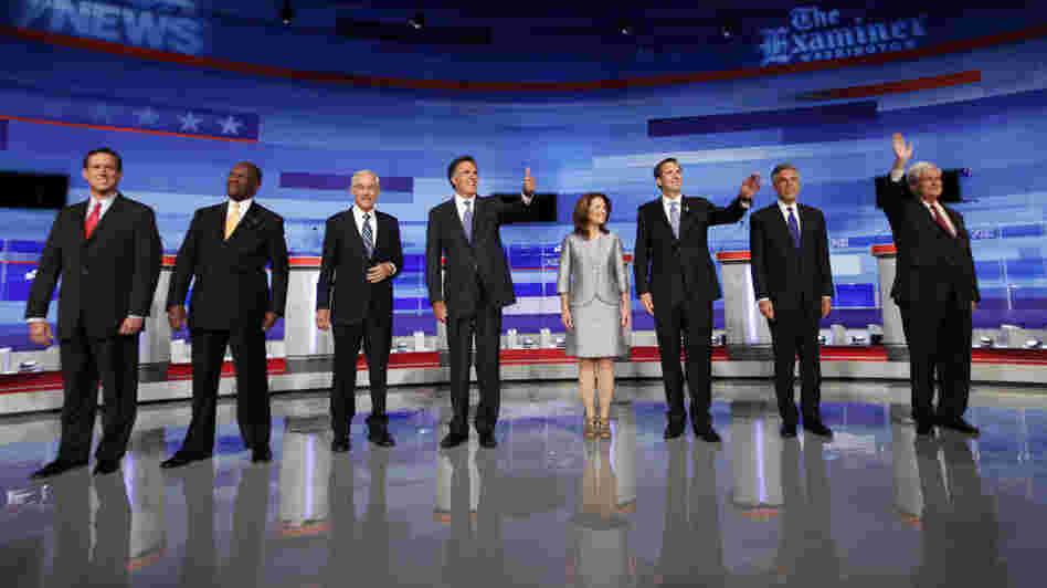 Republican presidential candidates participated in the Iowa GOP/Fox News Debate at the CY Stephens Auditorium in Ames, Iowa, Thursday. From left, former Sen. Rick Santorum (R-PA); businessman Herman Cain; Rep. Ron Paul (R-TX), former Massachusetts Gov. Mitt Romney; Rep. Michele Bachmann (R-MN); former Minnesota Gov. Tim Pawlenty; former Utah Gov. Jon Huntsman; former House Speaker Newt Gingrich.