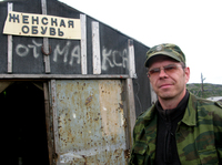 Andrei Udin, 33, works odd jobs around Teriberka — including at this repair shop — but he can't find steady work. He has grown impatient, fearing a natural gas processing plant promised to this community will never materialize.