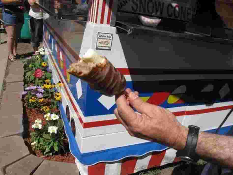 Don Gonyea holds deep-fried butter on a stick. Don Gonyea holds deep-fried butter on a stick.