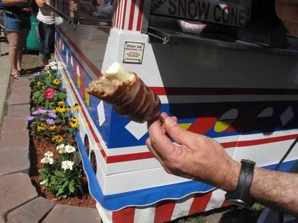 Don Gonyea holds deep-fried butter on a stick. Don Gonyea holds deep-fried butter on a stick.