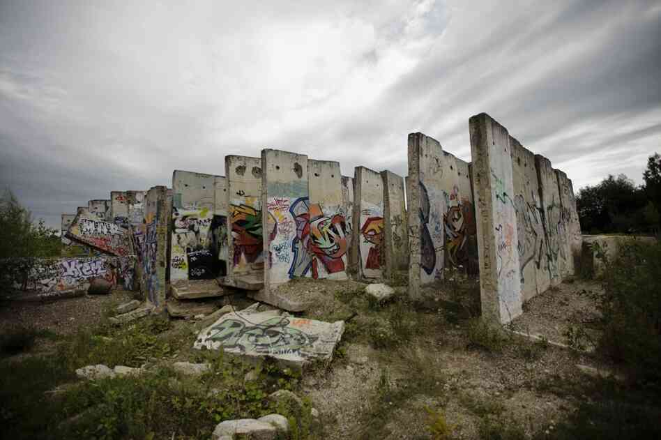 Original parts of the Berlin Wall stand at the site of a construction company in Teltow, Berlin, on Aug. 11, 2011. Saturday is the 50th anniversary of the construction of the wall, which divided the eastern and western parts of the city. 