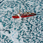 The Louis S. St Laurent icebreaker slices its way through the ice of the Northwest Passage.