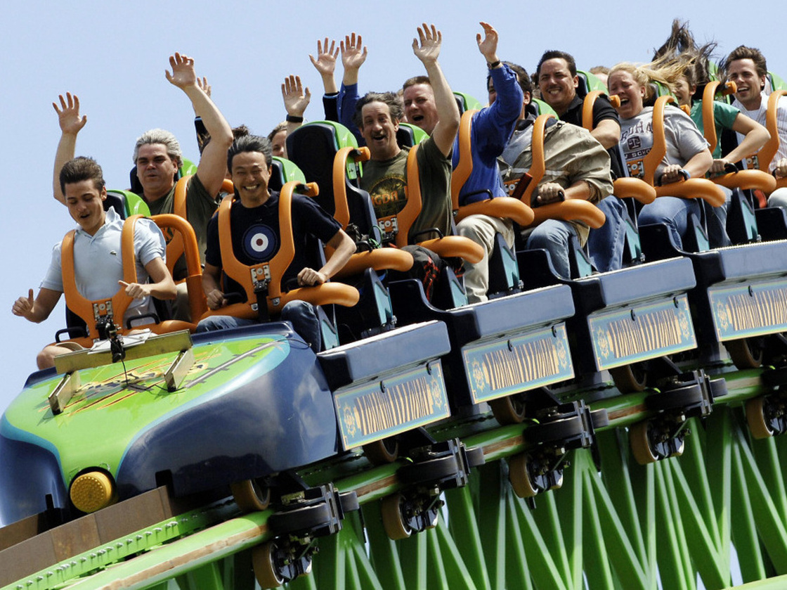Riders raise their arms as they travel the "Kingda Ka" roller coaster at Six Flags amusement park in Jackson, New Jersey. This is one of the many parks Karol Gadja would have visited this summer if his tripped hadn't been cut short.