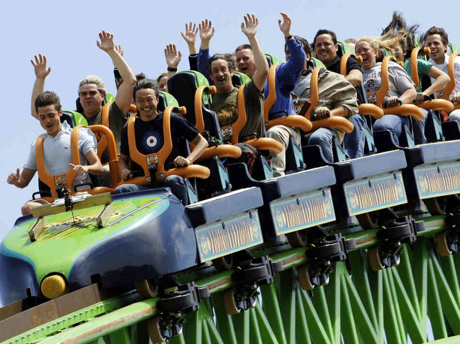 Riders raise their arms as they travel the "Kingda Ka" roller coaster at Six Flags amusement park in Jackson, New Jersey. This is one of the many parks Karol Gadja would have visited this summer if his tripped hadn't been cut short.
