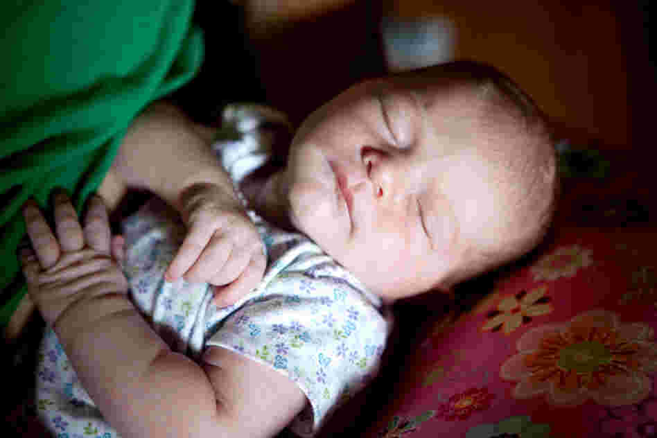Kiera Breen Earle is seen at home five days after her birth. The midwives returned to the Earle's home for a post-natal check up and to see how Shannon was doing.