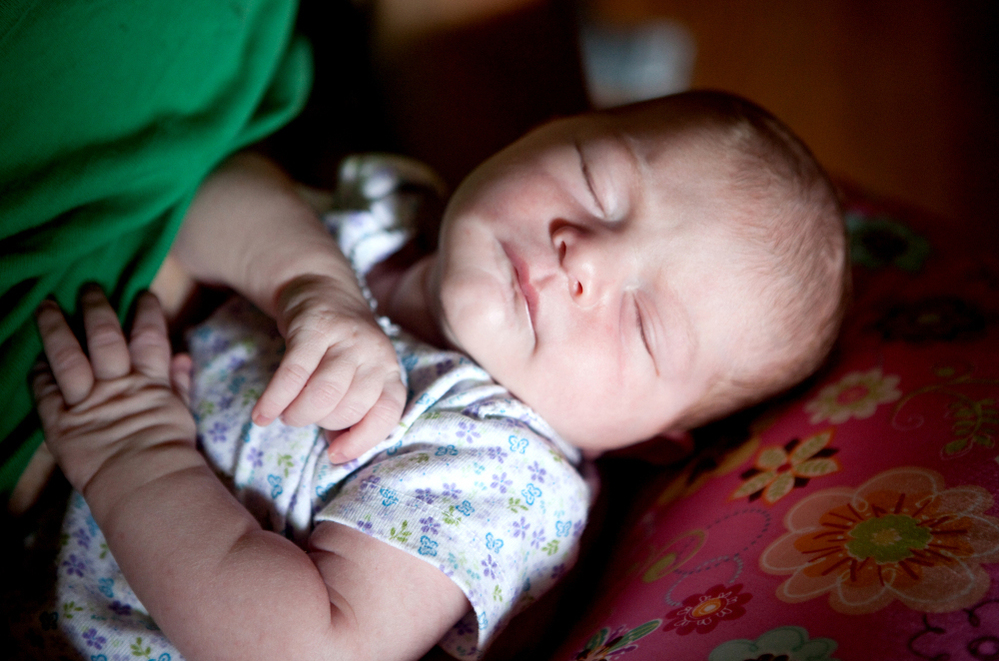 Kiera Breen Earle is seen at home five days after her birth. The midwives returned to the Earle's home for a post-natal check up and to see how Shannon was doing.