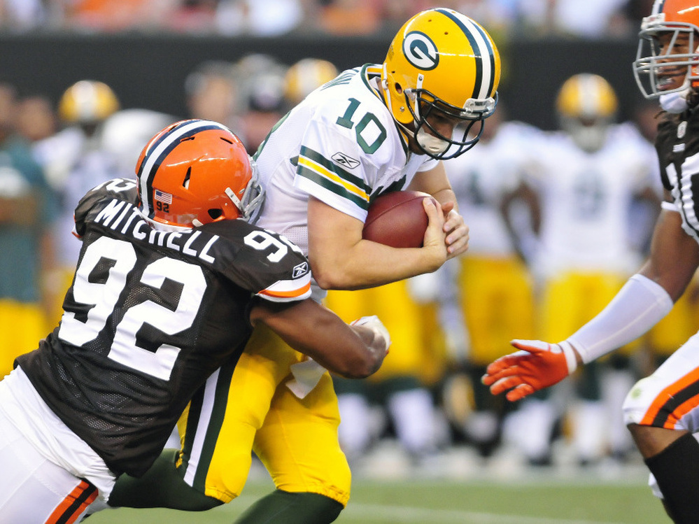 Green Bay Packers Quarterback Matt Flynn goes down hard during a preseason game vs. the Cleveland Browns on August 13. (Photo by Jason Miller/Getty Images)