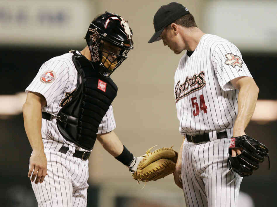 Ausmus (left), playing for the Houston Astros in 2006, talks with pitcher Brad Lidge on the mound during a game.
