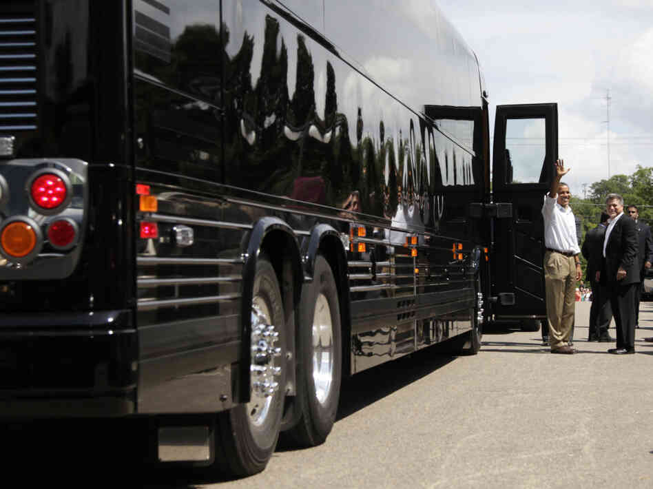 Bus Stop: President Obama waves before boarding his bus after having lunch and greeting people at The Old Market Deli on Monday,  in Cannon Falls, Minn., during his three-day economic bus tour.