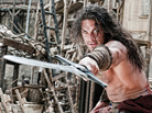 Conan O'Barbarian: Conan (Jason Momoa) is charged with using his wooden stoicism to prevent ancient warmongers from unleashing their supernatural hammy acting on an unsuspecting public. Though the film's lore tells us he was born on a battlefield, in truth this Conan was born out of Hollywood's current joint lust for remakes and sword-and-sandals mythos. Conan O'Barbarian: Conan (Jason Momoa) is charged with using his wooden stoicism to prevent ancient warmongers from unleashing their supernatural hammy acting on an unsuspecting public. Though the film's lore tells us he was born on a battlefield, in truth this Conan was born out of Hollywood's current joint lust for remakes and sword-and-sandals mythos.