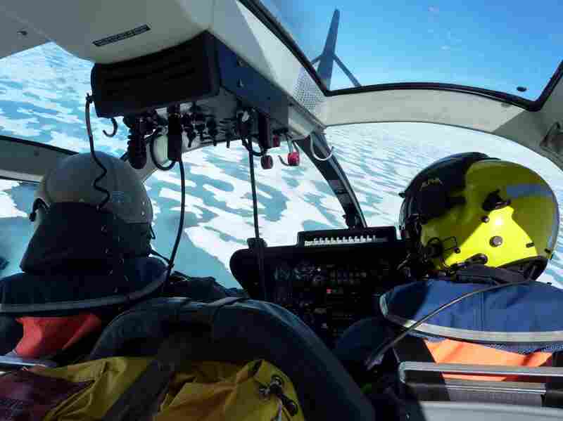From the ship's helicopter, the Northwest Passage appears as a patchwork of fractured ice and inky blue pools of water.