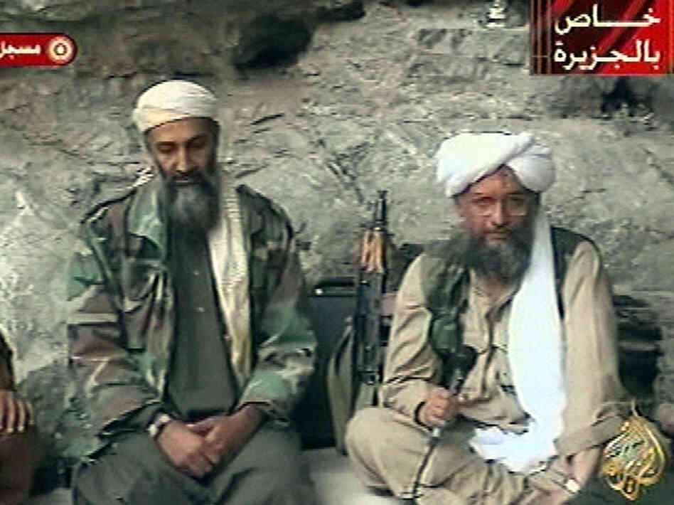 Osama bin Laden (left) and his top lieutenant, Egyptian Ayman al-Zawahiri, are seen at an undisclosed location in this television image broadcast Oct. 7, 2001. In Counterstrike, reporters Thom Shanker and Eric Schmitt say the United States tried to disrupt al-Qaida by attacking the organization's financiers and middlemen.