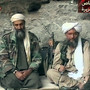 Osama bin Laden (left) and his top lieutenant, Egyptian Ayman al-Zawahiri, are seen at an undisclosed location in this television image broadcast Oct. 7, 2001. In Counterstrike, reporters Thom Shanker and Eric Schmitt say the United States tried to disrupt al-Qaida by attacking the organization's financiers and middlemen.