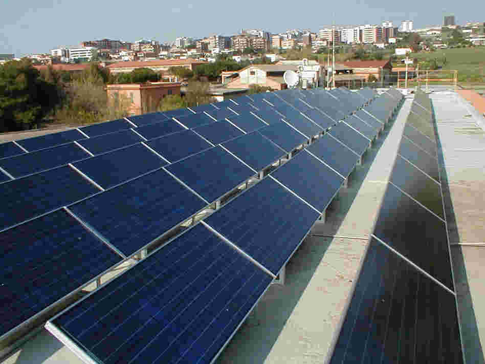 Evergreen Solar has filed for Chapter 11 bankruptcy relief, hoping to reorganize its debt and continue as a smaller company. Here, its panels are seen on a rooftop near Rome.