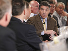 Republican presidential candidate Texas Gov. Rick Perry meets with business leaders at a lunch in Dubuque, Iowa, on Tuesday. Republican presidential candidate Texas Gov. Rick Perry meets with business leaders at a lunch in Dubuque, Iowa, on Tuesday.