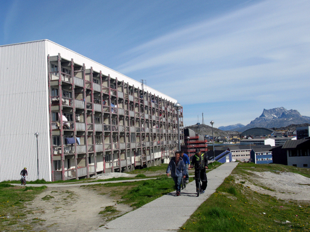 Some Soviet-style apartment blocks in the middle of Nuuk are crumbling, reeking and covered in graffiti. Apartments such as these were built in the 1960s and '70s to house Inuit hunters and fishermen forced out of their remote settlements to supply labor for fish factories.