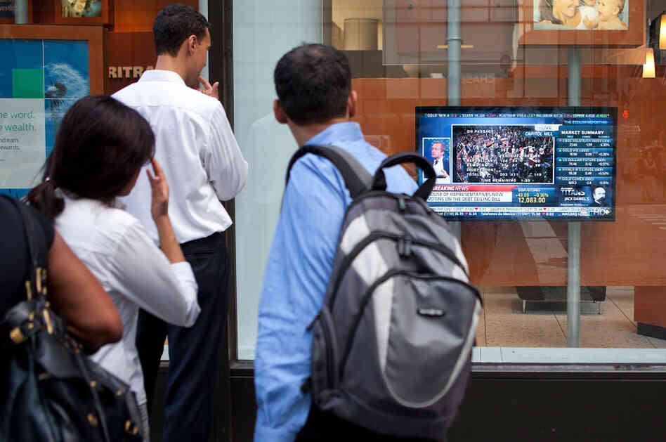 The new Gallup poll, which finds that only 13 percent of the U.S. public approves of how Congress is doing its job, is the group's first sampling since the debate over the federal debt ceiling. Many Americans watched an 11th-hour vote on that deal on TV, as pictured here.
