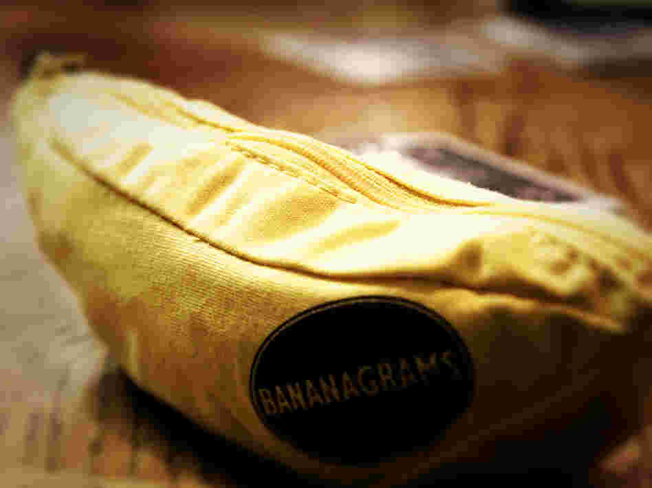 A Bananagram pouch holds 144 tiles, which are used to form words in a Scrabble-like formation — but without a board.