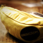 A Bananagram pouch holds 144 tiles, which are used to form words in a Scrabble-like formation — but without a board. A Bananagram pouch holds 144 tiles, which are used to form words in a Scrabble-like formation — but without a board.