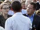 President Obama talks with Ryan Rhodes of the Iowa Tea Party Revolution and an unidentified woman in Decorah, Aug. 15, 2011. President Obama talks with Ryan Rhodes of the Iowa Tea Party Revolution and an unidentified woman in Decorah, Aug. 15, 2011.