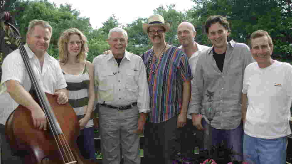 Tom T. Hall (third from left) poses with some of the collaborators who helped remake Songs of Fox Hollow, including co-producers Eric Brace (third from right) and Peter Cooper (second from right).