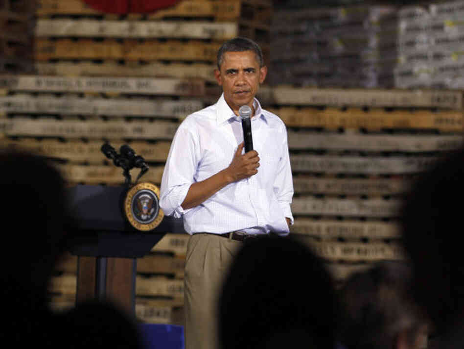 President Obama speaks Wednesday at a town hall-style meeting at Wyffels Hybrids Inc. in Atkinson, Ill. He is expected to unveil plans to stimulate the economy after Labor Day.
