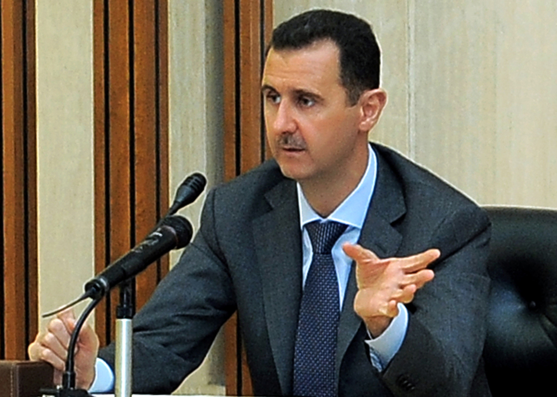A handout picture released by the official Syrian Arab News Agency (SANA) shows President Bashar al-Assad addressing the country on August 17.