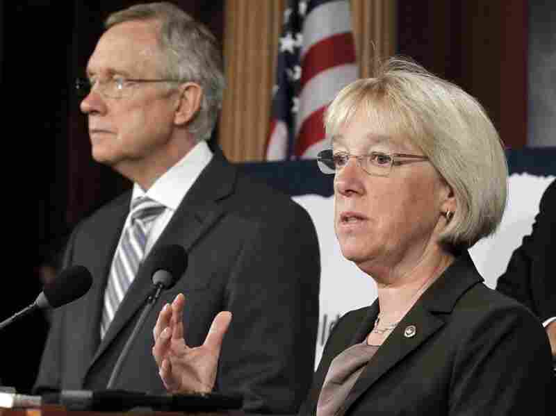 In this July 27 file photo, Sen. Patty Murray speaks as Senate Majority Leader Harry Reid listens at a news conference on Capitol Hill. Reid announced earlier this month he's naming Murray to co-chair a powerful supercommittee charged with finding more than $1 trillion in deficit cuts this fall. In this July 27 file photo, Sen. Patty Murray speaks as Senate Majority Leader Harry Reid listens at a news conference on Capitol Hill. Reid announced earlier this month he's naming Murray to co-chair a powerful supercommittee charged with finding more than $1 trillion in deficit cuts this fall.