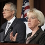 In this July 27 file photo, Sen.  Patty  Murray speaks as Senate Majority Leader Harry Reid listens at a news  conference on Capitol Hill. Reid announced earlier this month he's naming Murray to co-chair a powerful supercommittee charged  with finding more than $1 trillion in deficit cuts this fall.