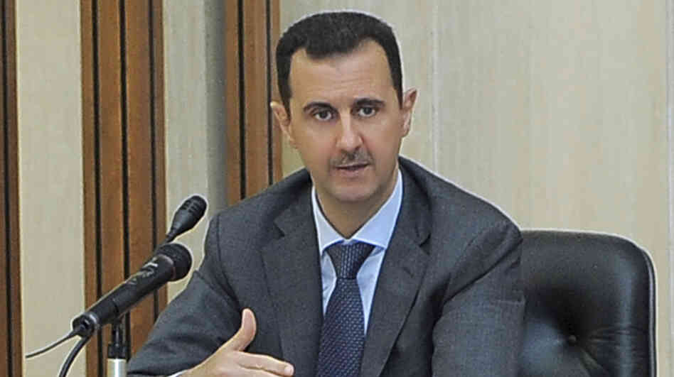 Syrian President Bashar Assad addresses a meeting of his Baath Party in Damascus, Syria, on Wednesday. President Obama called on Assad to step down, though it's not clear who would replace Assad if he quit or was ousted. Syrian President Bashar Assad addresses a meeting of his Baath Party in Damascus, Syria, on Wednesday. President Obama called on Assad to step down, though it's not clear who would replace Assad if he quit or was ousted.