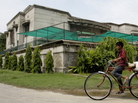 A boy rides a bike past the house of kidnapped American development expert Warren Weinstein in Lahore, Pakistan, on Monday. A boy rides a bike past the house of kidnapped American development expert Warren Weinstein in Lahore, Pakistan, on Monday.
