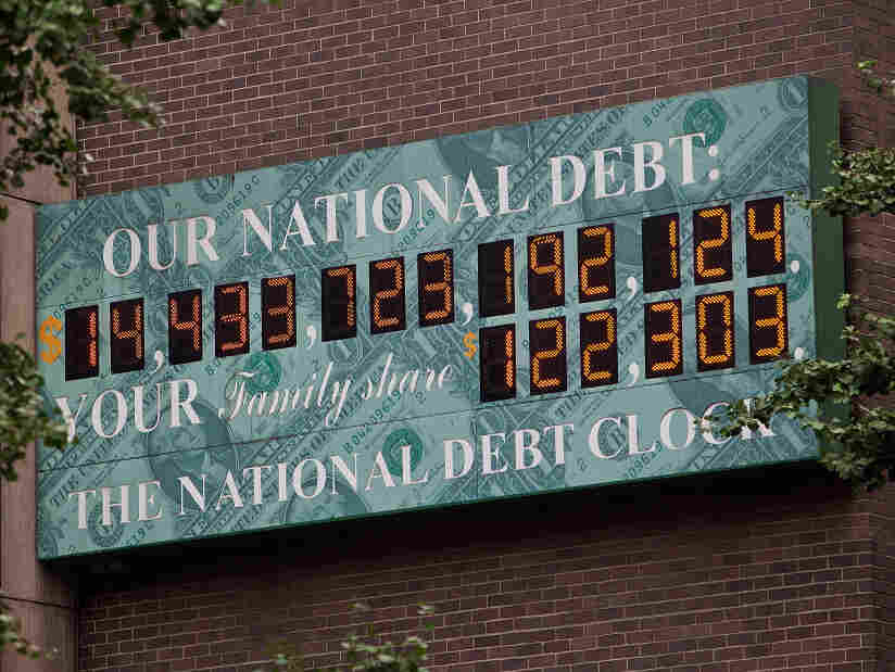 $14.4 trillion and counting: The National Debt Clock, a billboard-size digital display showing the increasing U.S. debt, is seen in New York City on Aug. 1. $14.4 trillion and counting: The National Debt Clock, a billboard-size digital display showing the increasing U.S. debt, is seen in New York City on Aug. 1.