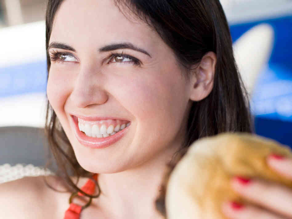 Look at her. So happy and care-free with her burger. But for how long? Look at her. So happy and care-free with her burger. But for how long?