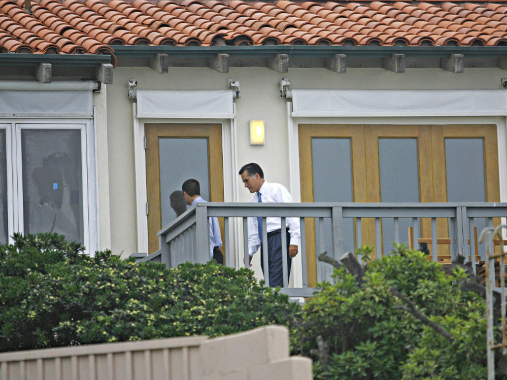 Gov. Mitt Romney entering his La Jolla, Calif. beach house, Aug. 28, 2008.