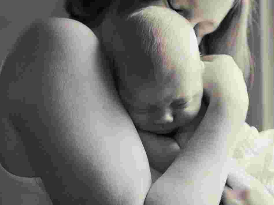 Sarah says photos like this, of her and Finn, helped her see who she is now.
