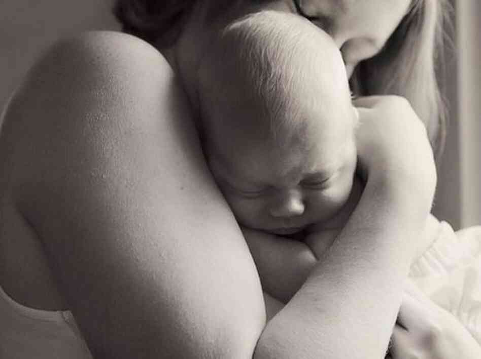 Sarah says photos like this, of her and Finn, helped her see who she is now.
