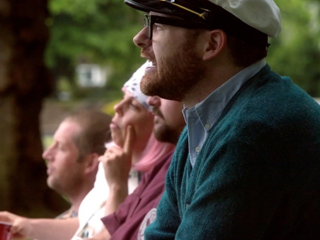 The Decemberists watch a dystopic tennis match.