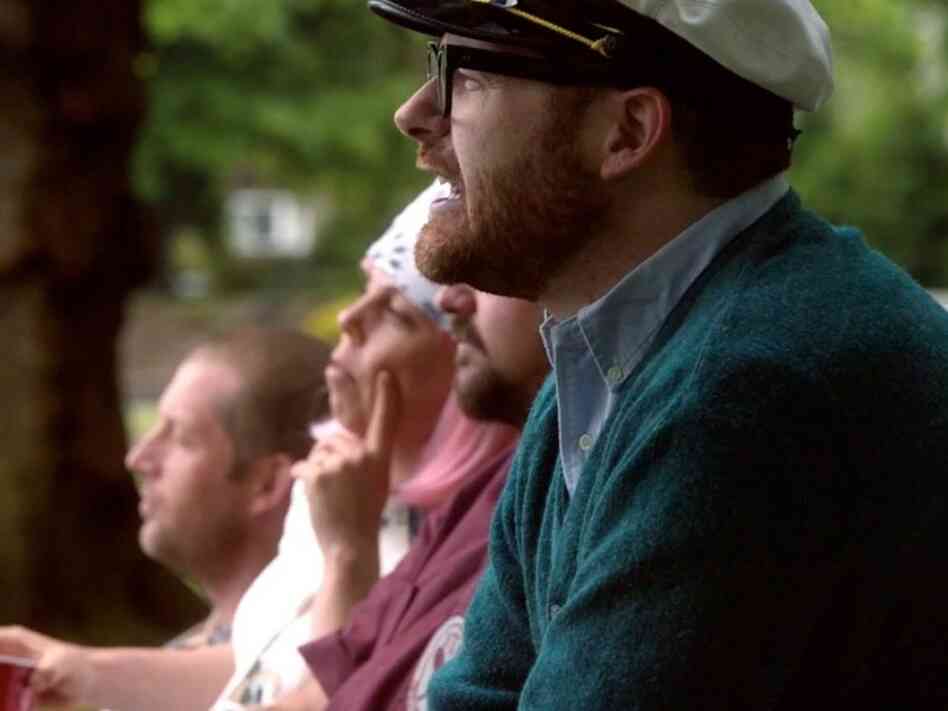 The Decemberists watch a dystopic tennis match.
