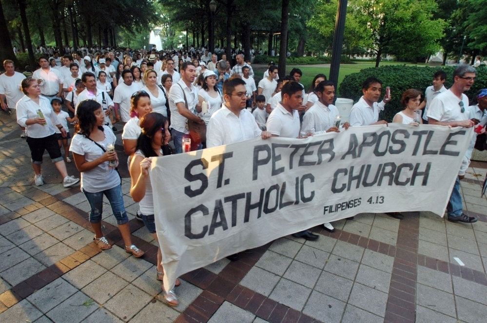 In June, marchers protested Alabama's new law cracking down on illegal immigration. The state's United Methodist, Episcopal and Roman Catholic churches have sued, arguing the law that's set to take effect Sept. 1 violates their religious freedom. In June, marchers protested Alabama's new law cracking down on illegal immigration. The state's United Methodist, Episcopal and Roman Catholic churches have sued, arguing the law that's set to take effect Sept. 1 violates their religious freedom.