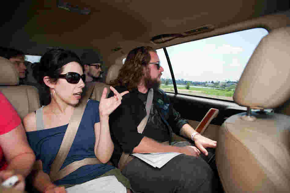 Rebecca Rothman points out a blasted field where students' apartments once stood.Our tour guides — community activists Laurie Johns and Rebecca Rothman, and University of Alabama professor Margaret Peacock — took us past key sites, including the Curry Building, where the county's emergency services had been housed; the Rosedale housing project; the once-picturesque Forest Lake neighborho...
