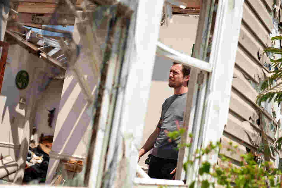 My Morning Jacket bassist Tom Blankenship surveys the scene.The wreckage in Tuscaloosa viscerally communicated the need this benefit concert would serve. My Morning Jacket learned about taking such a hands-on approach while working with the nonprofit activism resource group Air Traffic Control in New Orleans. "We went on a three-day retreat there that was really about activism, but focus...